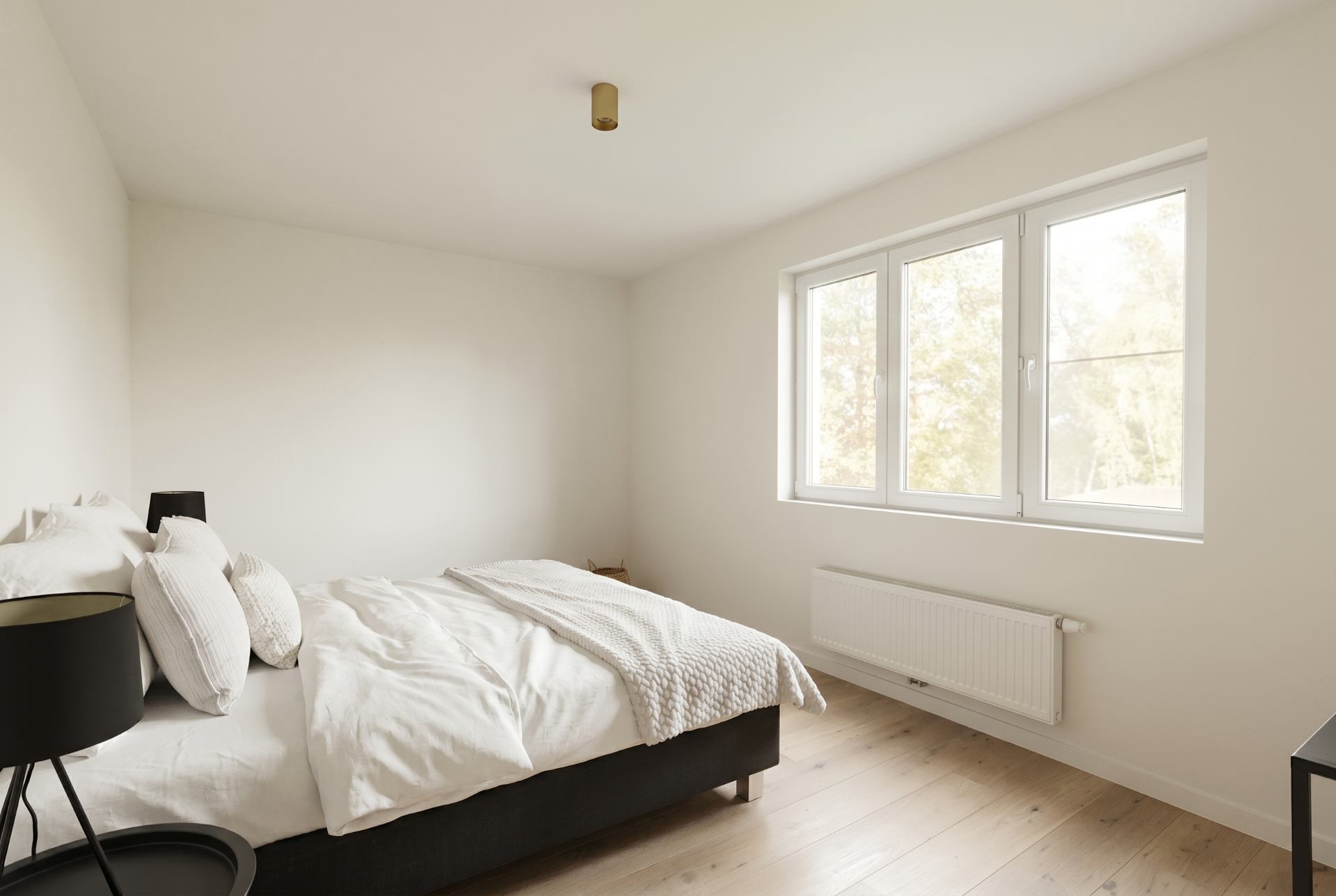 Lichtrijke slaapkamer met zicht op het groen